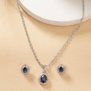 Rhodium Plated Silver Toned Tear Dropped Shaped Royal Blue American Diamond Studded Pendant Set