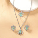 Rhodium Plated Silver Toned Sea Blue Tear Dropped Shaped American Diamond Studded Pendant Combo With Ring