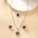 Rhodium Plated Silver Toned Heart Shaped Violet American Diamond Studded Pendant Combo With Ring