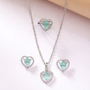 Rhodium Plated Silver Toned Heart Shaped Sea Blue American Diamond Studded Pendant Combo With Ring
