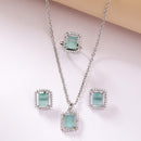 Rhodium Plated Silver Toned Square Shaped Sea Blue American Diamond Studded Pendant Combo With Ring