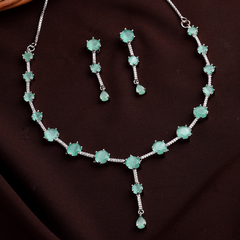 Rhodium Plated Silver Toned Circle Shaped Sea Green American Diamond Studded Jewellery Set