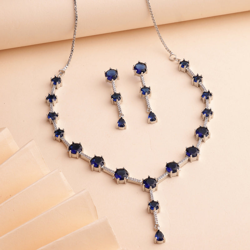 Rhodium Plated Silver Toned Circle Shaped Blue American Diamond Studded Jewellery Set