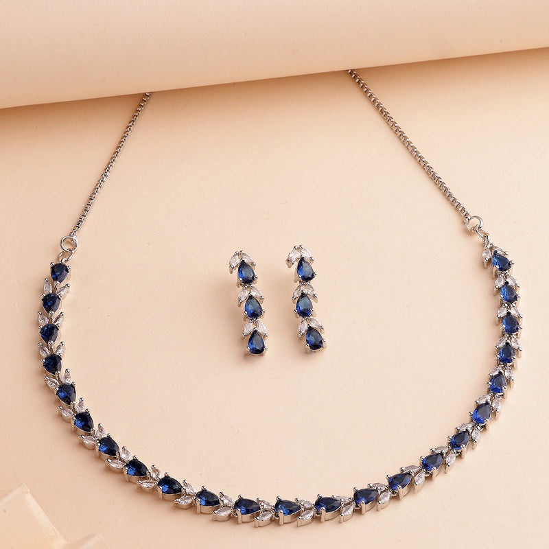 Rhodium Plated Silver Toned Teardrop Shaped Blue & White American Diamond Studded Jewellery Set