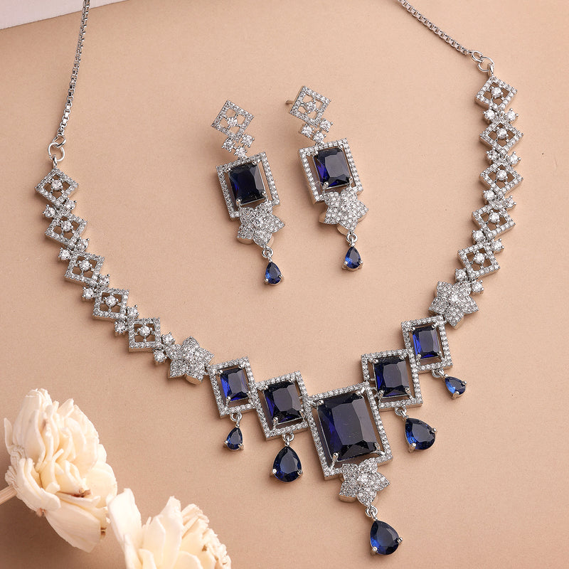 Rhodium Plated Silver Toned Rectangular Shaped Navy Blue & White American Diamond Studded Necklace With Earrings Jewellery Set