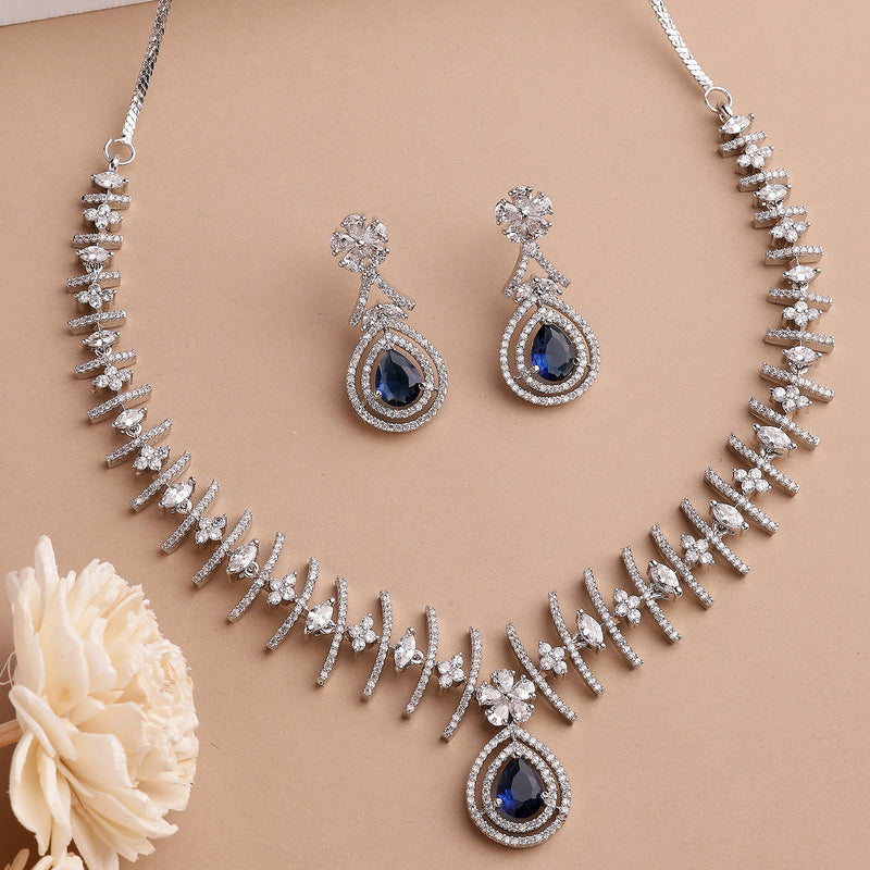 Rhodium Plated Silver Toned Teardrop Shaped Navy Blue & White American Diamond Studded Jewellery Set