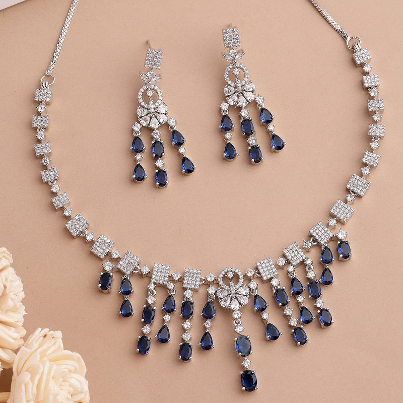Rhodium Plated Silver Toned Teardrop Shaped Blue & White American Diamond Studded Jewellery Set