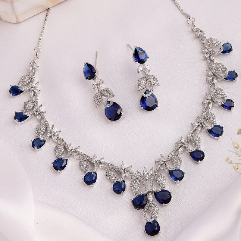 Rhodium Plated Silver Toned Leaf Teardrop Blue & White American Diamond Studded Jewellery Set