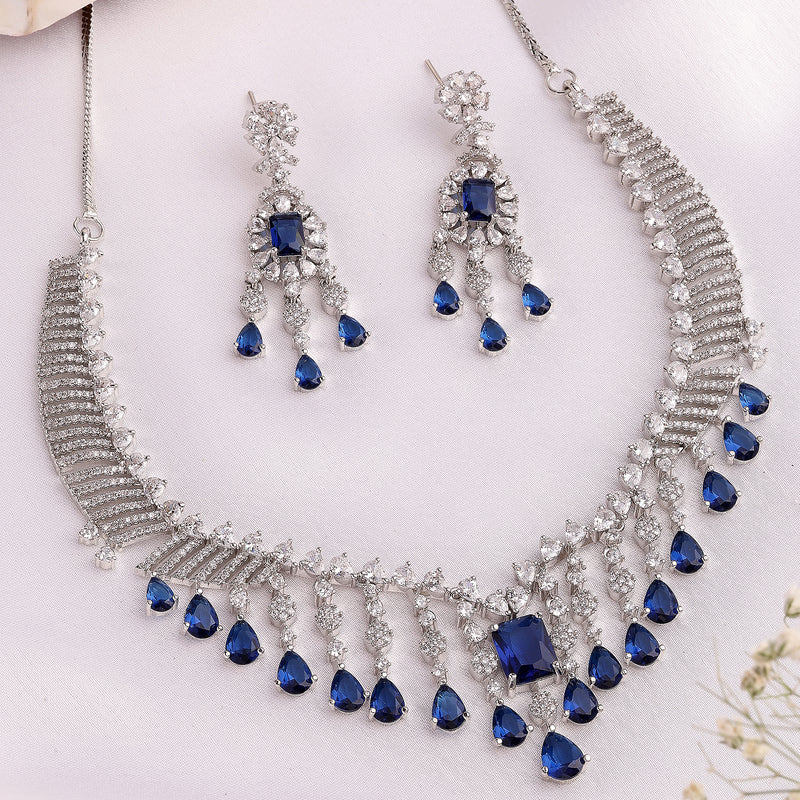 Rhodium Plated Silver Toned Teardrop Shaped Blue & White American Diamond Studded Jewellery Set