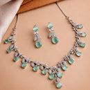 Rhodium Plated Silver Toned Leaf Teardrop Shaped Sea Green & White American Diamond Studded Jewellery Set