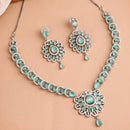 Rhodium Plated Silver Toned Ornate Shaped Sea Green & White American Diamond Studded Jewellery Set