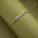 Rhodium Plated Silver Toned White Cubic Zirconia Studded Love Bracelet