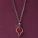 Rhodium Plated Silver Toned Red And White  American Diamond Studded Leaf Shaped Pendant With Chain