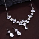 Rhodium Plated Silver Toned Floral Shaped White American Diamond Studded Jewellery Set