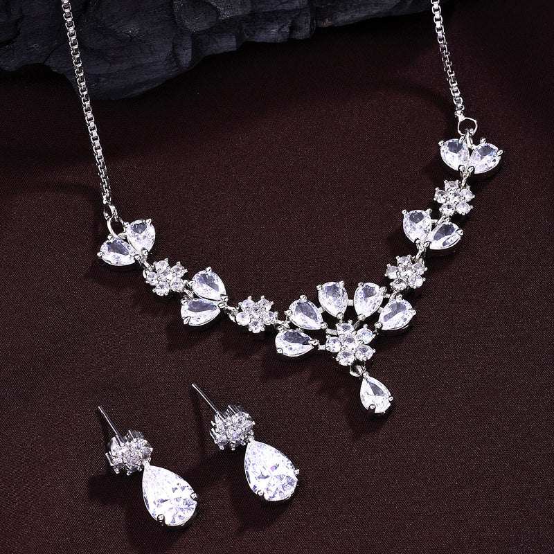 Rhodium Plated Silver Toned Floral Shaped White American Diamond Studded Jewellery Set
