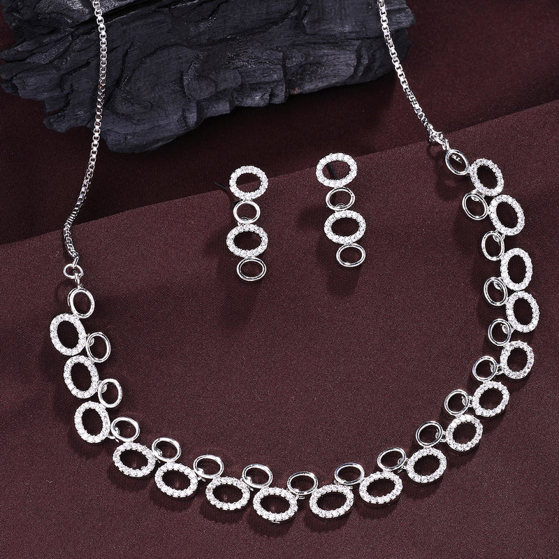 Rhodium Plated Silver Toned Oval Shaped White American Diamond Studded Jewellery Set