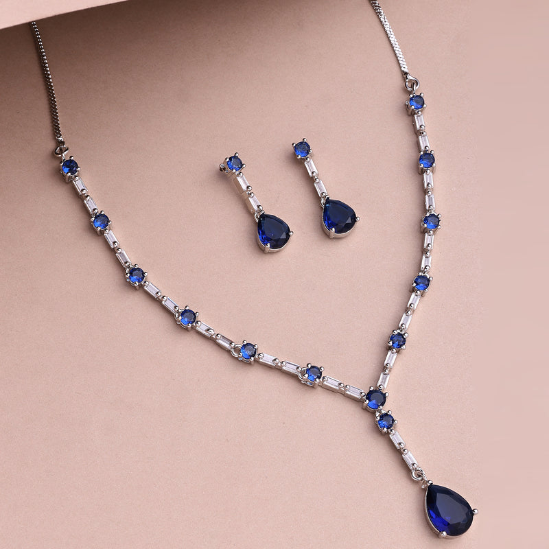 Rhodium Plated Silver Toned Teardrop Shaped Blue & White American Diamond Studded Jewellery Set