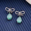 Rhodium Plated Silver Toned Bow Shaped Sea Green & White American Diamond Studded Drop Earrings