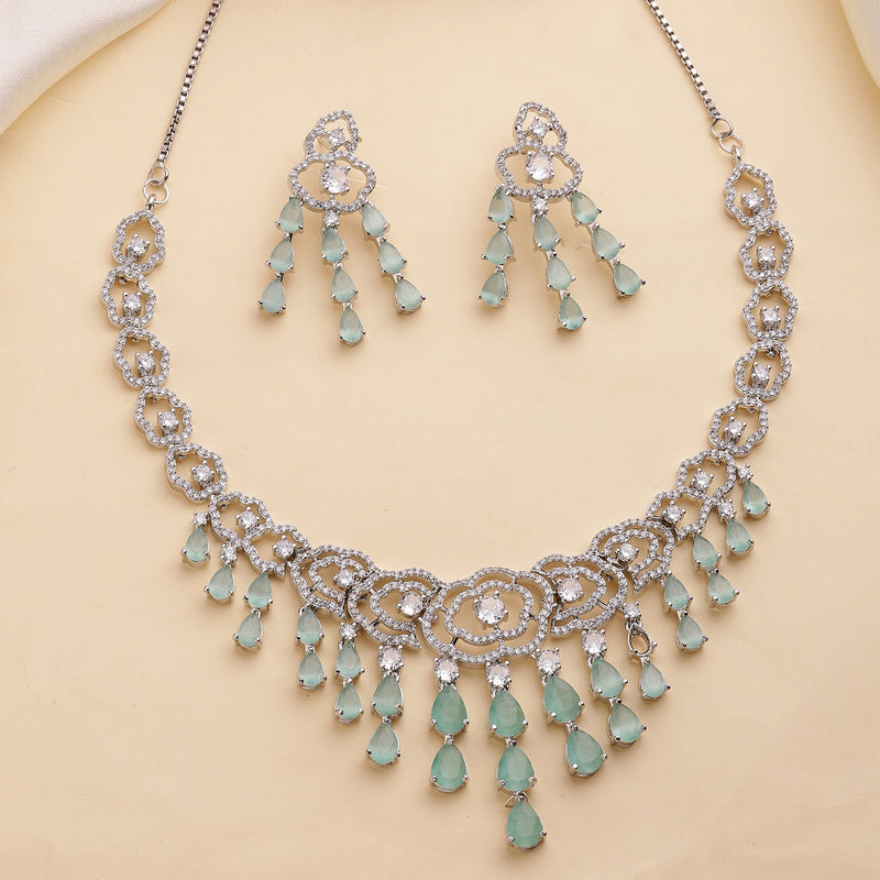 Rhodium Plated Silver Toned Floral Sea Green & White American Diamond Studded Jewellery Set