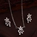 Rhodium Plated Silver Toned White American Diamond Studded Floral Teardrop Shaped Pendant Set