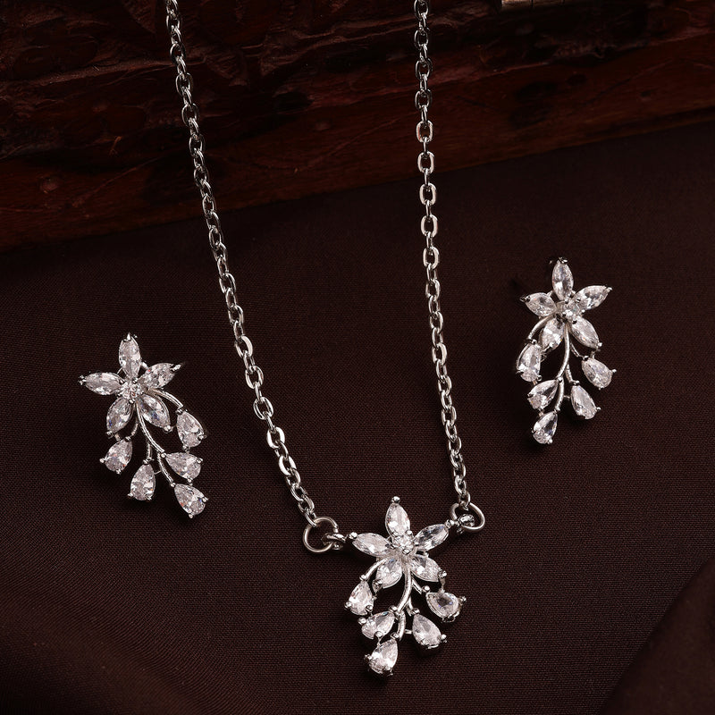 Rhodium Plated Silver Toned White American Diamond Studded Floral Teardrop Shaped Pendant Set