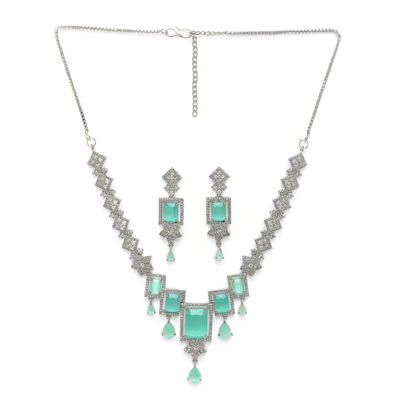 Rhodium Plated Silver Toned Rectangular Shaped Sea Green & White American Diamond Studded Jewellery Set