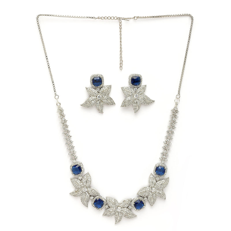 Rhodium Plated Silver Toned Floral Shaped Blue & White American Diamond Studded Jewellery Set