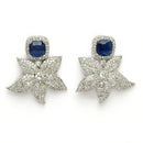 Rhodium Plated Silver Toned Floral Shaped Blue & White American Diamond Studded Jewellery Set