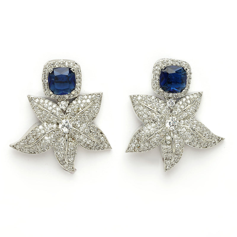 Rhodium Plated Silver Toned Floral Shaped Blue & White American Diamond Studded Jewellery Set