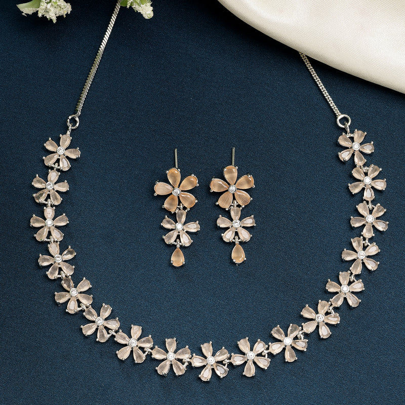 Rhodium Plated Silver Toned Floral Design Orange American Diamond Studded  Necklace With Matching Drop Earrings