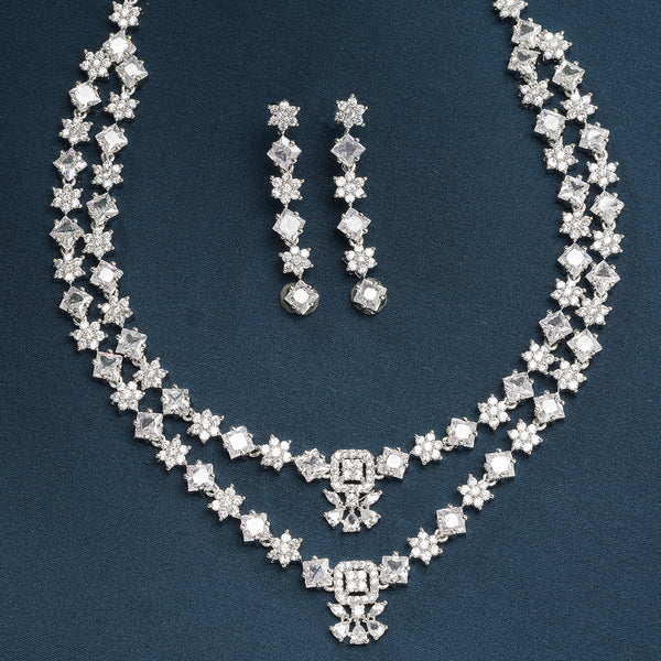 Rhodium Plated Silver Toned Floral Design White AD Studded  Necklace With Matching Drop Earrings