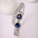 Rhodium Plated Silver Toned Blue Teardrop American Diamond Studded Cuff Bracelet