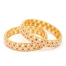 Gold Plated Floral Shaped White Pearl Studded Bangles Set Of 2