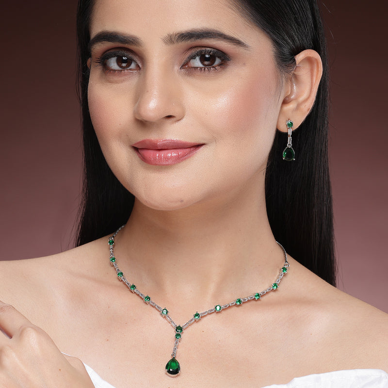 Rhodium Plated Silver Toned Teardrop Style Emerald Green American Diamond Studded Jewellery Set