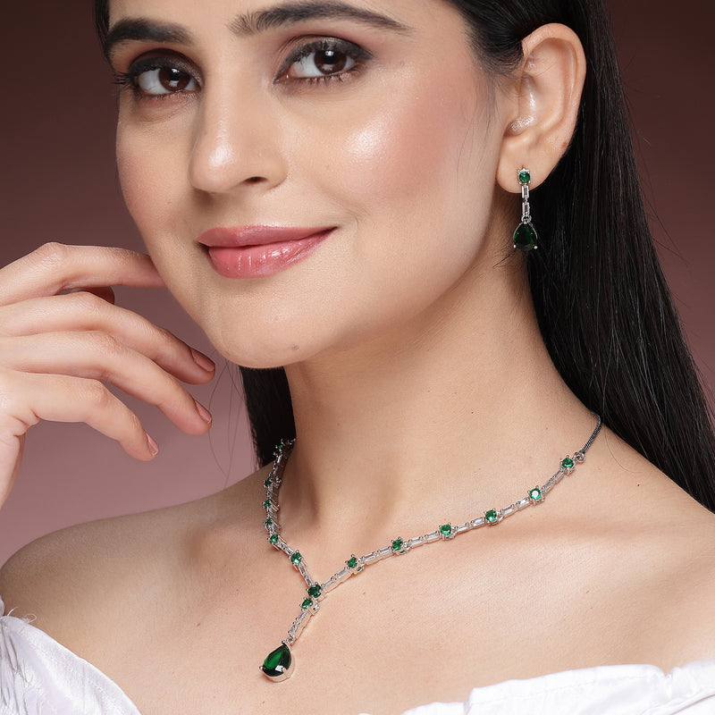 Rhodium Plated Silver Toned Teardrop Style Emerald Green American Diamond Studded Jewellery Set
