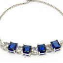 Rhodium Plated Silver Toned White Round & Blue Square Cut Studded Wraparound Adjustable Bracelet