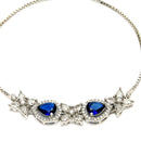 Rhodium Plated Silver Toned White Flower & Blue Teardrop American Diamond Studded Wraparound Adjustable Bracelet