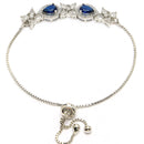 Rhodium Plated Silver Toned White Flower & Blue Teardrop American Diamond Studded Wraparound Adjustable Bracelet