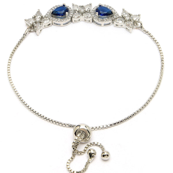 Rhodium Plated Silver Toned White Flower & Blue Teardrop American Diamond Studded Wraparound Adjustable Bracelet