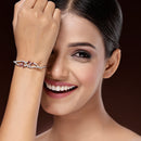 Rhodium Plated Silver Toned Floral Ruby Red American Diamond Studded Bracelet