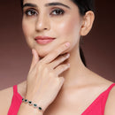 Rose Gold Plated Teardrop Shaped Emerald Green American Diamond Studded Bracelet