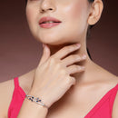 Rhodium Plated Silver Toned Floral Royal Blue American Diamond Studded Bracelet