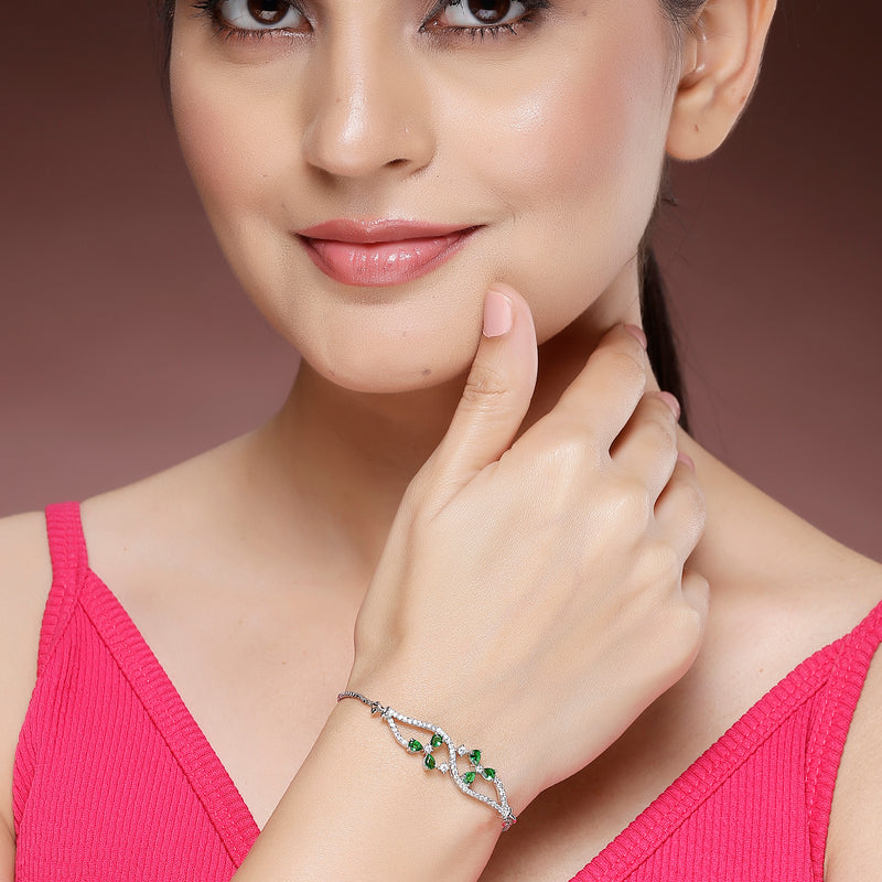 Rhodium Plated Silver Toned Floral  Emerald Green American Diamond Studded Bracelet