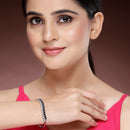 Rhodium Plated Silver Toned Leaf Shaped Royal Blue American Diamond Studded Bracelet