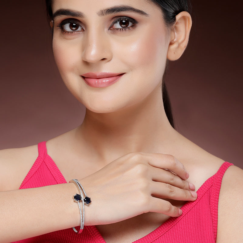 Rhodium Plated Silver Toned Round Shaped  Blue American Diamond Studded  Bracelet