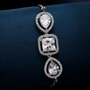 Rhodium Plated Silver Toned Square Shaped White American Diamond Studded Bracelet
