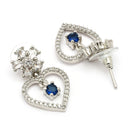 Rhodium Plated Silver Toned Hearty Floral Shaped Navy Blue & White American Diamond Studded Drop Earrings