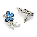 Rhodium Plated Silver Toned Floral Shaped Navy Blue & White American Diamond Studded Stud Earrings