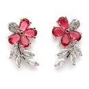 Rhodium Plated Silver Toned Floral Shaped Red & White American Diamond Studded Stud Earrings