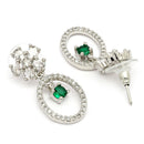 Rhodium Plated Silver Toned Floral Oval Shaped Green & White American Diamond Studded Drop Earrings